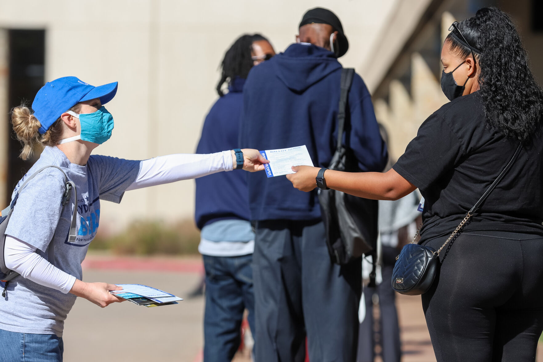 Photos: Metroplex voters brave cold weather at the polls, businesses board windows on Election Day